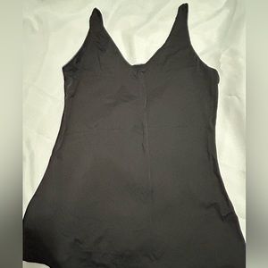 Black stretchy under tank; no tags but fits L/XL. Has both v-neck & round neck.